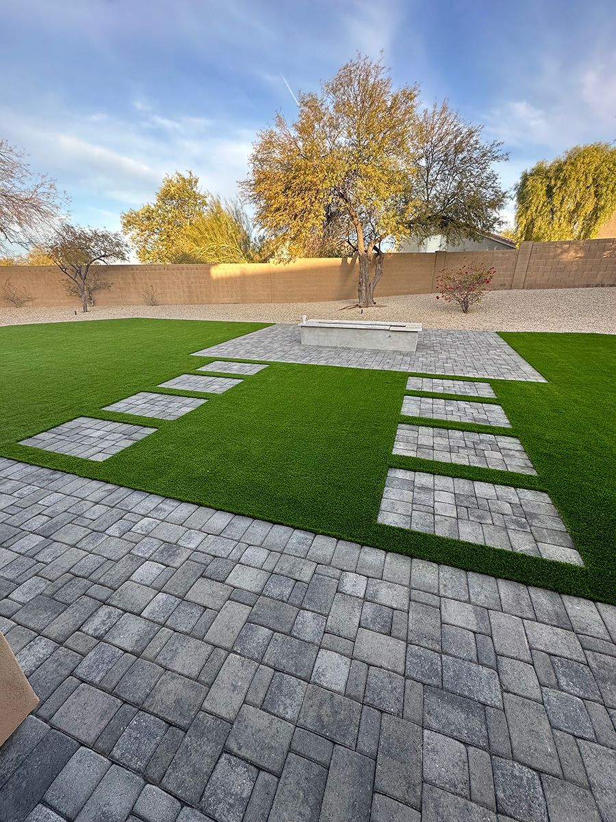 Artificial turf installation with pavers in Arizona